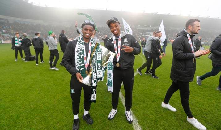 Plymouth Argyle promotion celebrations, Plymouth, UK 8 May 2023 Bali Mumba of Plymouth Argyle and Niall Ennis of Plymouth Argyle during Plymouth Argyle promotion celebrations on 8th May 2023 at Home Park, Plymouth, Devon - Plymouth Home Park Devon England Copyright: xDavexRowntree PPAUKx PPA-030062