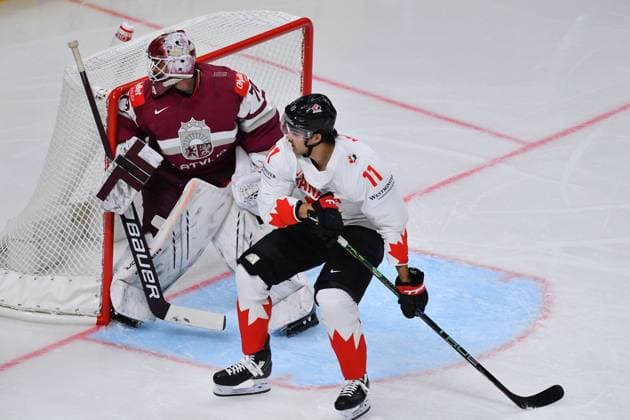 LATVIA, RIGA - 12.05.23: McBAIN Jack, PUNNENOVS Ivars. Game Latvia - Canada. IIHF 2023 Ice hockey, Eishockey World Championship, WM, Weltmeisterschaft  Copyright: xVITALIIxKLIUIEVx