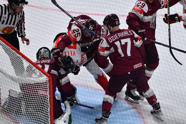 LATVIA, RIGA - 12.05.23: VELENO Joe, DZERINS Andris. Game Latvia - Canada. IIHF 2023 Ice hockey, Eishockey World Championship, WM, Weltmeisterschaft  Copyright: xVITALIIxKLIUIEVx