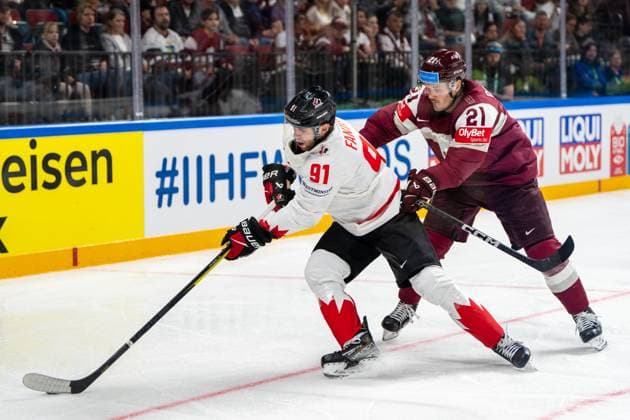 RIGA, LATVIA - MAY 12: Adam Fantilli of Canada (L) against Rudolfs Balcers of Latvia (R) during the 2023 IIHF Ice hockey, Eishockey World Championship, WM, Weltmeisterschaft Finland - Latvia game between Latvia and Canada at Arena Riga on May 12, 2023 in Riga, Latvia. Riga Arena Riga Latvia Copyright: xJustPictures.ch JarixPestelaccix