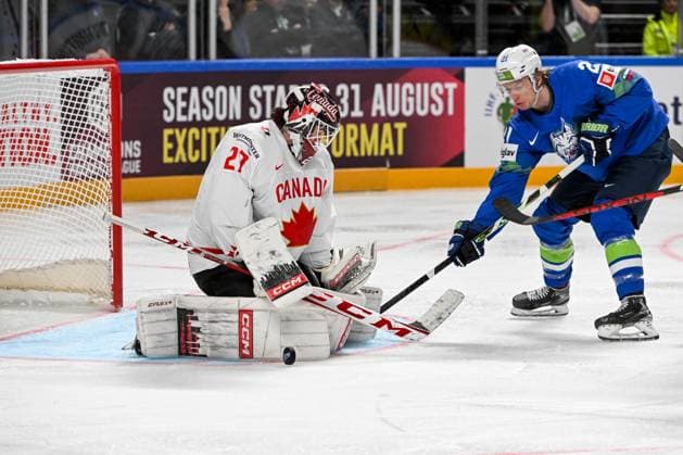 RIGA, LATVIA - MAY 14: Jan Drozg of Slovenia tries to score against goalkeeper Devon Levi of Canada during the 2023 IIHF Ice hockey, Eishockey World Championship, WM, Weltmeisterschaft Finland - Latvia game between Slovenia and Canada at Arena Riga on May 14, 2023 in Riga, Latvia. Riga Arena Riga Latvia Copyright: xJustPictures.ch AndreaxBrancax