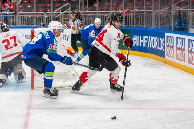 RIGA, LATVIA - MAY 14: Ethan Bear of Canada (R) against Ken Ograjensek of Slovenia (L) during the 2023 IIHF Ice hockey, Eishockey World Championship, WM, Weltmeisterschaft Finland - Latvia game between Slovenia and Canada at Arena Riga on May 14, 2023 in Riga, Latvia. Riga Arena Riga Latvia Copyright: xJustPictures.ch JarixPestelaccix