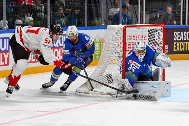 RIGA, LATVIA - MAY 14: Tyler Myers of Canada tries to score against Aleksandar Magovac of Slovenia (L) and goalkeeper Luka Gracnar of Slovenia (R) during the 2023 IIHF Ice hockey, Eishockey World Championship, WM, Weltmeisterschaft Finland - Latvia game between Slovenia and Canada at Arena Riga on May 14, 2023 in Riga, Latvia. Riga Arena Riga Latvia Copyright: xJustPictures.ch AndreaxBrancax