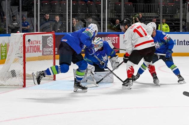 RIGA, LATVIA - MAY 14: Milan Lucic of Canada scores a goal against goalkeeper Luka Gracnar of Slovenia during the 2023 IIHF Ice hockey, Eishockey World Championship, WM, Weltmeisterschaft Finland - Latvia game between Slovenia and Canada at Arena Riga on May 14, 2023 in Riga, Latvia. Riga Arena Riga Latvia Copyright: xJustPictures.ch AndreaxBrancax