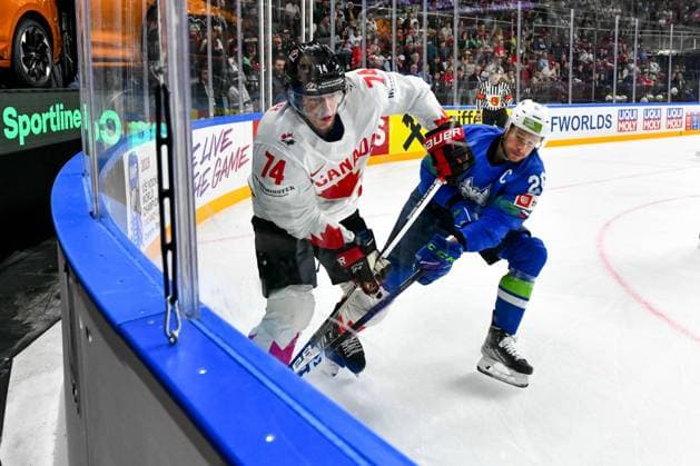 RIGA, LATVIA - MAY 14: Ethan Bear of Canada protects the puck along the board against Jan Urbas of Slovenia during the 2023 IIHF Ice hockey, Eishockey World Championship, WM, Weltmeisterschaft Finland - Latvia game between Slovenia and Canada at Arena Riga on May 14, 2023 in Riga, Latvia. Riga Arena Riga Latvia Copyright: xJustPictures.ch AndreaxBrancax