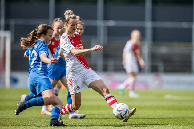 FLYERALARM. Frauen Fussball Bundesliga, 1. FC Koeln - SV Meppen 1912 e.V. Kara Bathmann (SV Meppen 1912 e.V., 22), Jana Beuschlein (1. FC Koeln, 23) FLYERALARM Frauen Fussball Bundesliga, 1. FC Koeln - SV Meppen 1912 e.V., Koeln, Geissbockheim am 14.05.2023 DFB REGULATIONS PROHIBIT ANY USE OF PHOTOGRAPHS AS IMAGE SEQUENCES AND OR QUASI-VIDEO. Copyright: xBEAUTIFULxSPORTS Wunderlx