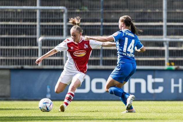 FLYERALARM. Frauen Fussball Bundesliga, 1. FC Koeln - SV Meppen 1912 e.V. Laura Donhauser (1. FC Koeln, 25), Milla Punsar (SV Meppen 1912 e.V., 14) FLYERALARM Frauen Fussball Bundesliga, 1. FC Koeln - SV Meppen 1912 e.V., Koeln, Geissbockheim am 14.05.2023 DFB REGULATIONS PROHIBIT ANY USE OF PHOTOGRAPHS AS IMAGE SEQUENCES AND OR QUASI-VIDEO. Copyright: xBEAUTIFULxSPORTS Wunderlx