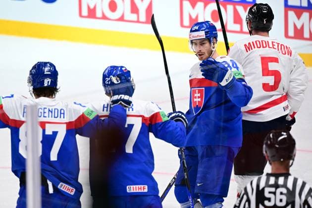 L-R Pavol Regenda, Marek Hrivik and Peter Cehlarik (all SVK) celebrate the goal (1:1) during the IIHF Ice hockey, Eishockey World Championship, WM, Weltmeisterschaft Group B match Slovakia vs Canada, on May 15, 2023, in Riga, Latvia. (CTKxPhoto DavidxTanecek) CTKPhotoP2023051505269  CTKPhotoP2023051505269