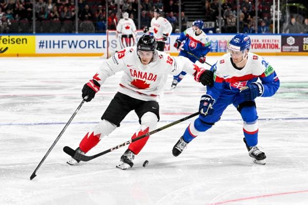 RIGA, LATVIA - MAY 15: Peyton Krebs of Canada protects the puck against Samuel Knazko of Slovakia during the 2023 IIHF Ice hockey, Eishockey World Championship, WM, Weltmeisterschaft Finland - Latvia game between Slovakia and Canada at Arena Riga on May 15, 2023 in Riga, Latvia. Riga Arena Riga Latvia Copyright: xJustPictures.ch AndreaxBrancax