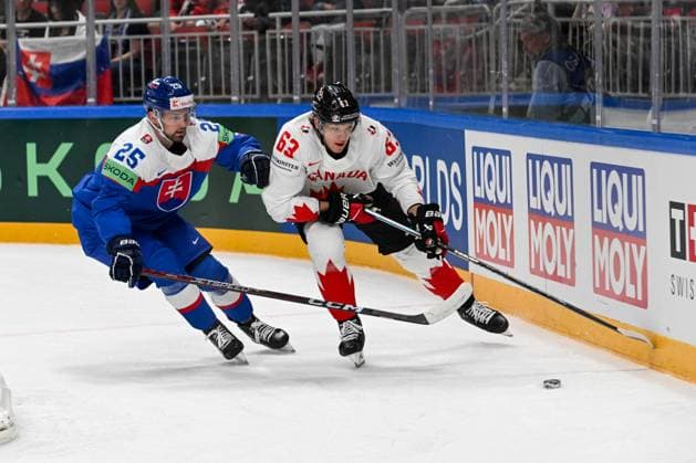 RIGA, LATVIA - MAY 15: Jake Neighbours of Canada fights for the puck possession against Alex Tamasi of Slovakia during the 2023 IIHF Ice hockey, Eishockey World Championship, WM, Weltmeisterschaft Finland - Latvia game between Slovakia and Canada at Arena Riga on May 15, 2023 in Riga, Latvia. Riga Arena Riga Latvia Copyright: xJustPictures.ch AndreaxBrancax