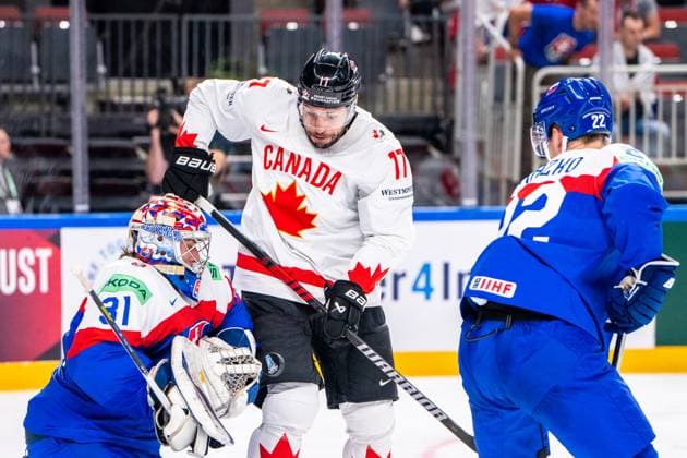 RIGA, LATVIA - MAY 15: Milan Lucic of Canada (C) deflect the puck in from of Samuel Hlavaj of Slovakia (L) during the 2023 IIHF Ice hockey, Eishockey World Championship, WM, Weltmeisterschaft Finland - Latvia game between Slovakia and Canada at Arena Riga on May 15, 2023 in Riga, Latvia. Riga Arena Riga Latvia Copyright: xJustPictures.ch JarixPestelaccix