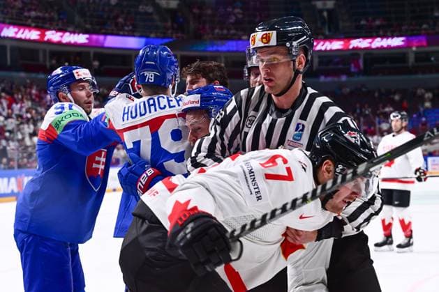 L-R Matus Sukel (SVK), Libor Hudacek (SVK), Adam Janosik (SVK) and Lawson Crouse (CAN) in skirmish during the IIHF Ice hockey, Eishockey World Championship, WM, Weltmeisterschaft Group B match Slovakia vs Canada, on May 15, 2023, in Riga, Latvia. (CTKxPhoto DavidxTanecek) CTKPhotoP2023051505984  CTKPhotoP2023051505984