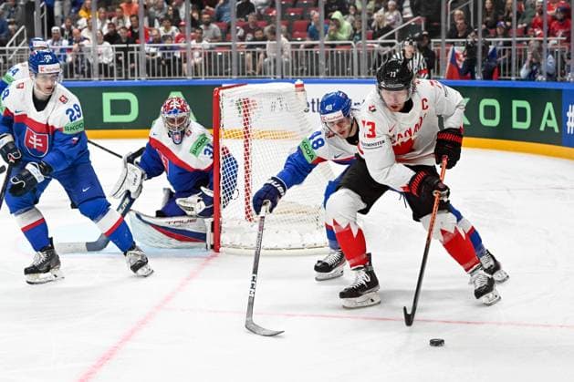 RIGA, LATVIA - MAY 15: Tyler Toffoli of Canada protects the puck against Viliam Cacho of Slovakia during the 2023 IIHF Ice hockey, Eishockey World Championship, WM, Weltmeisterschaft Finland - Latvia game between Slovakia and Canada at Arena Riga on May 15, 2023 in Riga, Latvia. Riga Arena Riga Latvia Copyright: xJustPictures.ch AndreaxBrancax