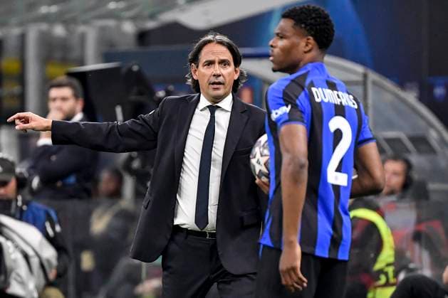 Simone Inzaghi head coach of FC Internazionale and Denzel Dumfries during the Uefa Champions League football match between FC Internazionale and AC Milan at San Siro stadium in Milan (Italy), May 16th 2023. andreaxstaccioli