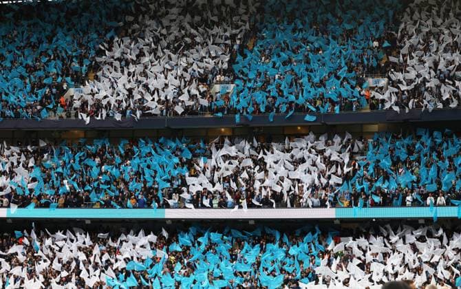 Manchester, England, 17th May 2023. Fans hold up colours before the UEFA Champions League match at the Etihad Stadium, Manchester. Picture credit should read: Darren Staples Sportimage EDITORIAL USE ONLY. No use with unauthorised audio, video, data, fixture lists, club league logos or live services. Online in-match use limited to 120 images, no video emulation. No use in betting, games or single club league player publications. SPI-2446-0041