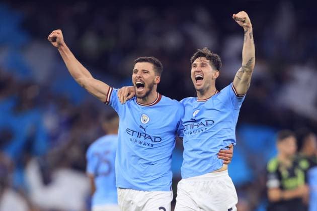 Football - UEFA Champions League - Semi-Final (2nd Leg) - Manchester City v Real Madrid 17th May 2023 - UEFA Champions League - Semi-Final (2nd Leg) - Manchester City v Real Madrid - Ruben Dias of Manchester City and John Stones of Manchester City celebrate victory - Photo: Simon Stacpoole Offside. Manchester UK Copyright: xSimonxStacpoolexOffside