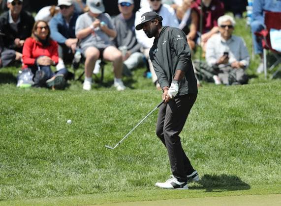 Sahth Theegala chips onto the 12th green during the first round of the 2023 PGA, Golf Herren Championship at Oakwood Country Club in Rochester,New York on Thursday, May 18, 2023.  PGA20230518113 AARONxJOSEFCZYK