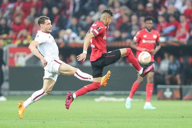 Germany, Leverkusen, 18.05.2023, BayArena, Bayer 04 Leverkusen - AS Rom - Uefa Europa Leaque, Andrea Belotti (AS Rom) und Piero Hincapie (Bayer 04 Leverkusen) battle for the ball Leverkusen BayArena North Rhine-Westfalia Germany