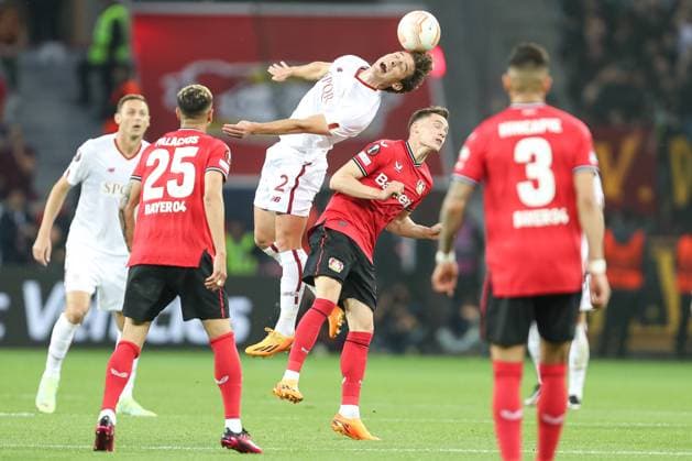 Germany, Leverkusen, 18.05.2023, BayArena, Bayer 04 Leverkusen - AS Rom - Uefa Europa Leaque, Edoardo Bove (AS Rom) und Florian Wirtz (Bayer 04 Leverkusen) battle for the ball Leverkusen BayArena North Rhine-Westfalia Germany