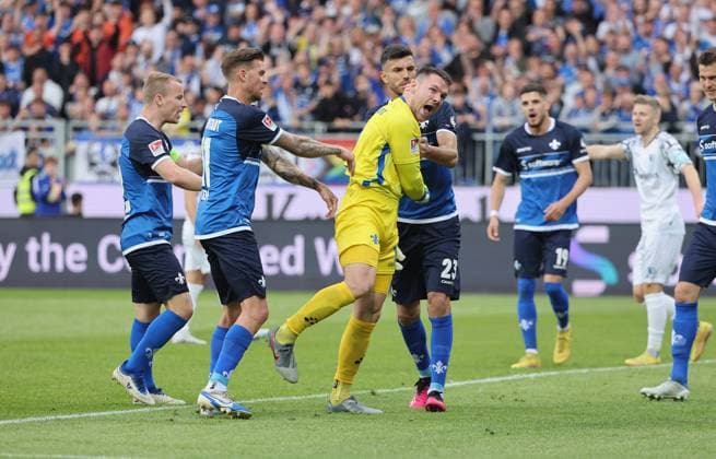19.05.2023, xdcx, Fussball 2. Bundesliga, SV Darmstadt 98 - 1. FC Magdeburg, emonline, emspor, despor, v.l., Fabian Holland (SV Darmstadt 98), Tobias Kempe (SV Darmstadt 98), Torwart Marcel Schuhen (SV Darmstadt 98), Klaus Gjasula (SV Darmstadt 98) jubelnd bejubelt jubelt jubeln DFL DFB REGULATIONS PROHIBIT ANY USE OF PHOTOGRAPHS AS IMAGE SEQUENCES AND OR QUASI-VIDEO.