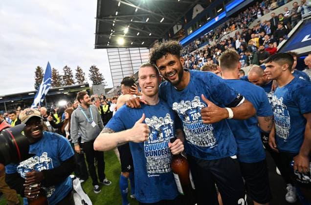 19.05.2023, xfux, Fussball 2.Bundesliga, SV Darmstadt 98 - 1.FC Magdeburg, emonline, emspor, v.l. Thomas Isherwood (SV Darmstadt 98), Aaron Seydel (SV Darmstadt 98) (DFL DFB REGULATIONS PROHIBIT ANY USE OF PHOTOGRAPHS as IMAGE SEQUENCES and or QUASI-VIDEO. Eine Lizenzierung des Lichtbildwerkes an den SV Darmstadt 1898 e.V. sowie Tochterunternehmen ist nicht gestattet. NO release of or sale to SV Darmstadt 1898 e.V.) Darmstadt
