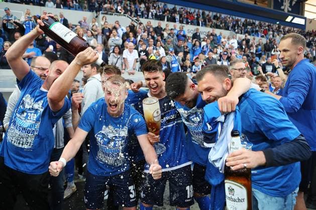 19.05.2023, xtvx, Fussball 2.Bundesliga, SV Darmstadt 98 - 1.FC Magdeburg emspor, emonline, v.l. nach dem Spiel, after the match Jubel Fabian Holland (SV Darmstadt 98) Mathias Honsak (SV Darmstadt 98) Emir Karic (SV Darmstadt 98) (DFL DFB REGULATIONS PROHIBIT ANY USE OF PHOTOGRAPHS as IMAGE SEQUENCES and or QUASI-VIDEO) Darmstadt