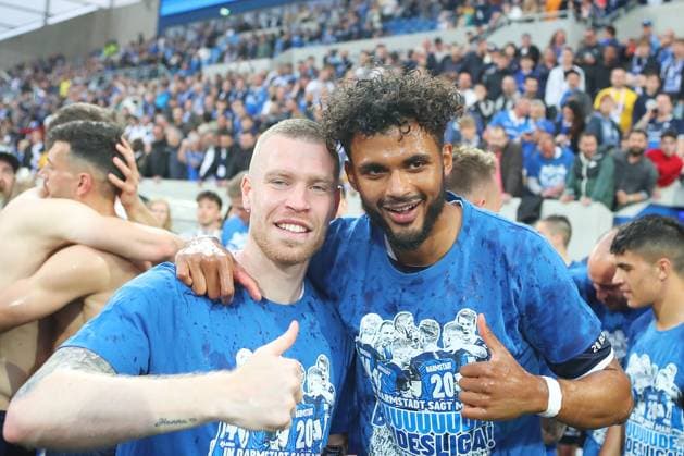 19.05.2023, xtvx, Fussball 2.Bundesliga, SV Darmstadt 98 - 1.FC Magdeburg emspor, emonline, v.l. nach dem Spiel, after the match Jubel Thomas Isherwood (SV Darmstadt 98) Aaron Seydel (SV Darmstadt 98) (DFL DFB REGULATIONS PROHIBIT ANY USE OF PHOTOGRAPHS as IMAGE SEQUENCES and or QUASI-VIDEO) Darmstadt