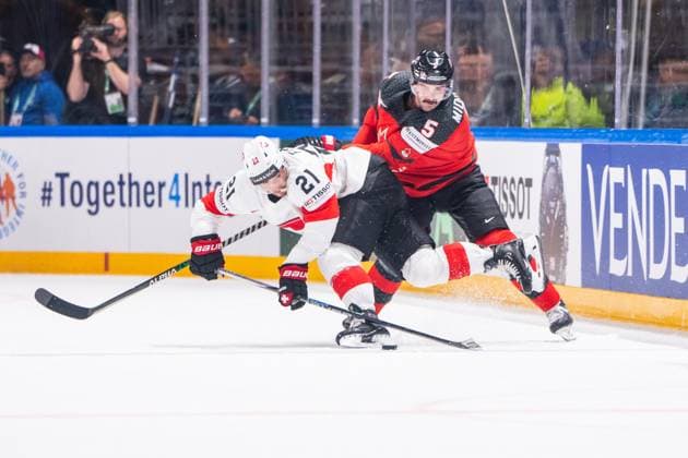 RIGA, LATVIA - MAY 20: Kevin Fiala of Switzerland (L) against Jacob Middleton of Canada (R) during the 2023 IIHF Ice hockey, Eishockey World Championship, WM, Weltmeisterschaft Finland - Latvia game between Canada Switzerland at Arena Riga on May 20, 2023 in Riga, Latvia. Riga Arena Riga Latvia Copyright: xJustPictures.ch JarixPestelaccix