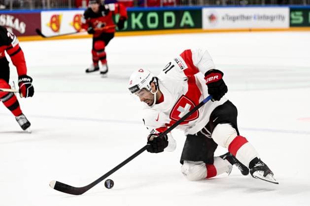 RIGA, LATVIA - MAY 20: Andres Ambuhl of Switzerland controls the puck during the 2023 IIHF Ice hockey, Eishockey World Championship, WM, Weltmeisterschaft Finland - Latvia game between Canada Switzerland at Arena Riga on May 20, 2023 in Riga, Latvia. Riga Arena Riga Latvia Copyright: xJustPictures.ch AndreaxBrancax