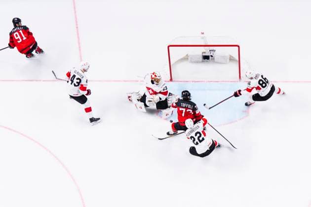RIGA, LATVIA - MAY 20: Janis Moser of Switzerland (L) helping goalkeeper Leonardo Genoni of Switzerland during the 2023 IIHF Ice hockey, Eishockey World Championship, WM, Weltmeisterschaft Finland - Latvia game between Canada Switzerland at Arena Riga on May 20, 2023 in Riga, Latvia. Riga Arena Riga Latvia Copyright: xJustPictures.ch JarixPestelaccix