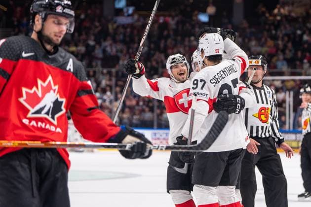 RIGA, LATVIA - MAY 20: Kevin Fiala of Switzerland (2nd from L) and Jonas Siegenthaler of Switzerland (R) celebrates Nico Hischier of Switzerland (not showed) for his goal during the 2023 IIHF Ice hockey, Eishockey World Championship, WM, Weltmeisterschaft Finland - Latvia game between Canada Switzerland at Arena Riga on May 20, 2023 in Riga, Latvia. Riga Arena Riga Latvia Copyright: xJustPictures.ch JarixPestelaccix