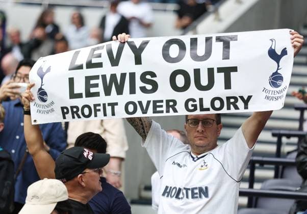 London, England, 20th May 2023. Tottenham fans hold up a sign saying ˜Levy Out Lewis Out™ during the Premier League match at the Tottenham Hotspur Stadium, London. Picture credit should read: Paul Terry Sportimage EDITORIAL USE ONLY. No use with unauthorised audio, video, data, fixture lists, club league logos or live services. Online in-match use limited to 120 images, no video emulation. No use in betting, games or single club league player publications. SPI-2452-0035