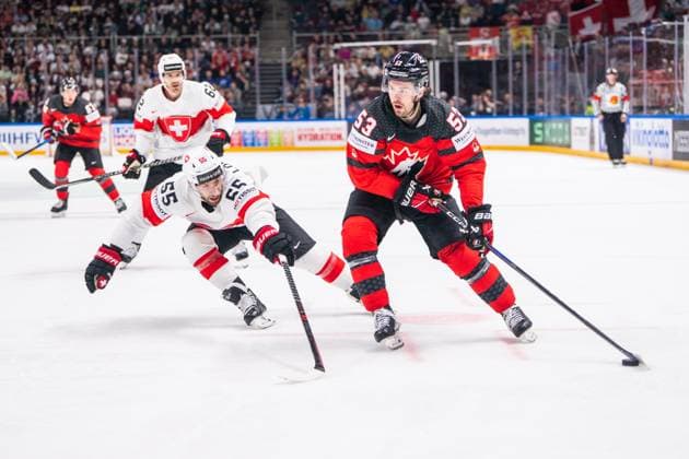 RIGA, LATVIA - MAY 20: Michael Carcone of Canada (R) against Romain Loeffel of Switzerland (L) during the 2023 IIHF Ice hockey, Eishockey World Championship, WM, Weltmeisterschaft Finland - Latvia game between Canada Switzerland at Arena Riga on May 20, 2023 in Riga, Latvia. Riga Arena Riga Latvia Copyright: xJustPictures.ch JarixPestelaccix