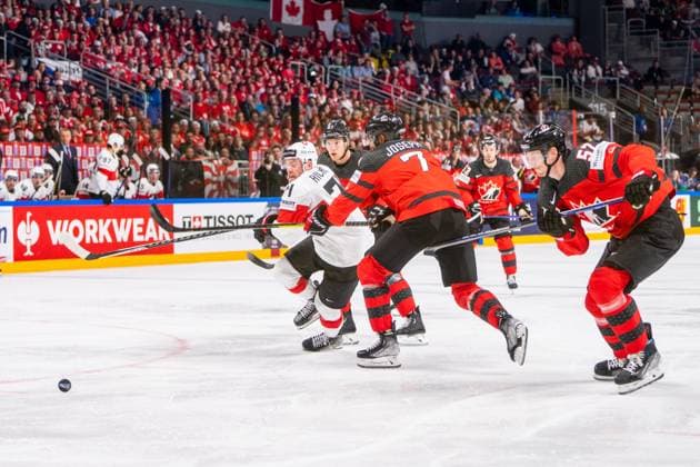 RIGA, LATVIA - MAY 20: Tanner Richard of Switzerland (L) against Pierre-Olivier Joseph of Canada (C) during the 2023 IIHF Ice hockey, Eishockey World Championship, WM, Weltmeisterschaft Finland - Latvia game between Canada Switzerland at Arena Riga on May 20, 2023 in Riga, Latvia. Riga Arena Riga Latvia Copyright: xJustPictures.ch JarixPestelaccix