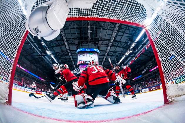 RIGA, LATVIA - MAY 20: Dario Simion of Switzerland (L) against Jacob Middleton of Canada (C)and goalkeeper Samuel Montembeault of Canada (R) scores the 3-1 during the 2023 IIHF Ice hockey, Eishockey World Championship, WM, Weltmeisterschaft Finland - Latvia game between Canada Switzerland at Arena Riga on May 20, 2023 in Riga, Latvia. Riga Arena Riga Latvia Copyright: xJustPictures.ch JarixPestelaccix