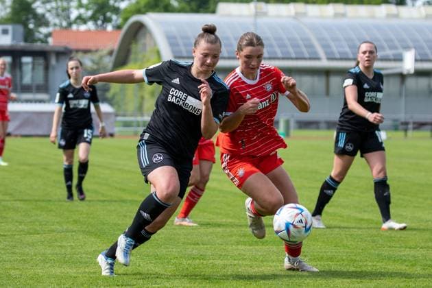 21.05.2023 - Fussball - Frauen Damen - Saison 2022 2023 - 2. Bundesliga - 25. Spieltag: FC Bayern München II - 1. FC Nürnberg FCN ( Club ) - Sportfoto Zink DaEn - xdaxenx -regulations prohibit any use of photographs as image sequences and or quasi-video - Jessica May (6, 1. FC Nürnberg FCN, links ) gg ???