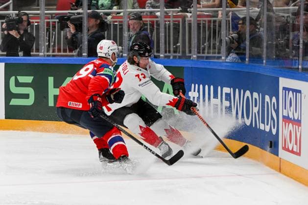 RIGA, LATVIA - MAY 22: Tyler Toffoli of Canada and Christian Kaasastul of Norway battle for the puck during the 2023 IIHF Ice hockey, Eishockey World Championship, WM, Weltmeisterschaft Finland - Latvia game between Canada and Norway at Arena Riga on May 22, 2023 in Riga, Latvia. Riga Arena Riga Latvia Copyright: xJustPictures.ch AndreaxBrancax