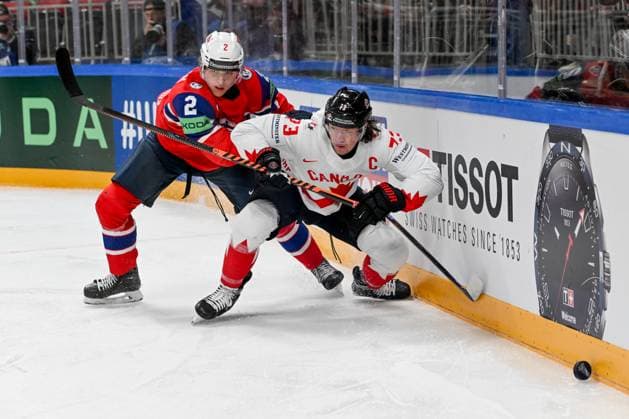 RIGA, LATVIA - MAY 22: Tyler Toffoli of Canada battle for the puck against Isak Hansen of Norway during the 2023 IIHF Ice hockey, Eishockey World Championship, WM, Weltmeisterschaft Finland - Latvia game between Canada and Norway at Arena Riga on May 22, 2023 in Riga, Latvia. Riga Arena Riga Latvia Copyright: xJustPictures.ch AndreaxBrancax