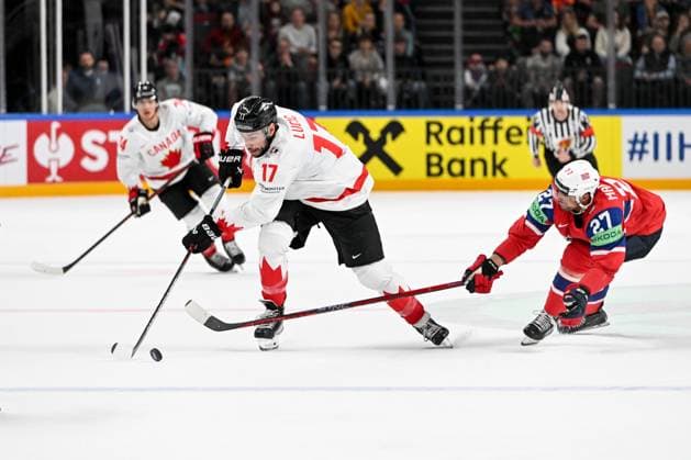 RIGA, LATVIA - MAY 22: Milan Lucic of Canada defends the puck against Andreas Martinsen of Norway during the 2023 IIHF Ice hockey, Eishockey World Championship, WM, Weltmeisterschaft Finland - Latvia game between Canada and Norway at Arena Riga on May 22, 2023 in Riga, Latvia. Riga Arena Riga Latvia Copyright: xJustPictures.ch AndreaxBrancax