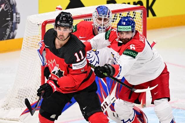From left Jack McBain of Canada, goalie Karel Vejmelka, Michal Kempny, both of Czech Republic in action during the IIHF Ice hockey, Eishockey World Championship, WM, Weltmeisterschaft Group B match Czech Republic vs Canada, on May 23, 2023, in Riga, Latvia. (CTKxPhoto DavidxTanecek) CTKPhotoP2023052305920 CTKPhotoP2023052305920