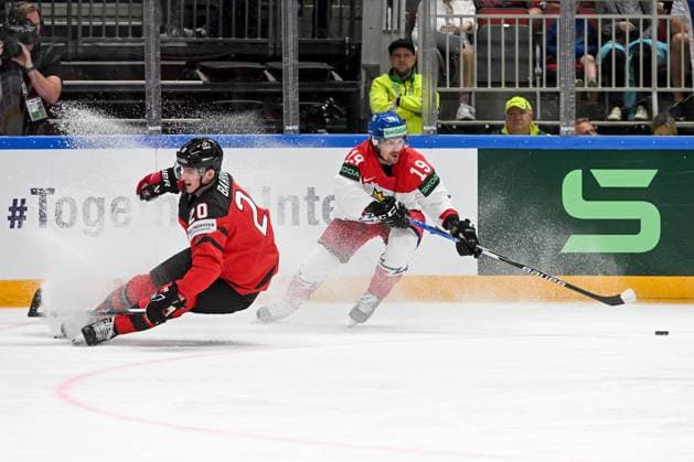 RIGA, LATVIA - MAY 23: Jakub Flek of Czech Republic protects the puck against Justin Barron of Canada during the 2023 IIHF Ice hockey, Eishockey World Championship, WM, Weltmeisterschaft Finland - Latvia game between Canada and Czech Republic at Arena Riga on May 23, 2023 in Riga, Latvia. Riga Arena Riga Latvia Copyright: xJustPictures.ch AndreaxBrancax