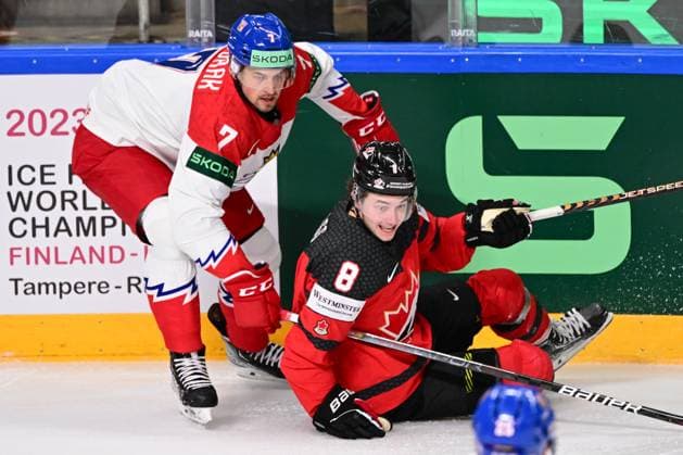 From left Czech Tomas Dvorak, Cody Glass of Canada in action during the IIHF Ice hockey, Eishockey World Championship, WM, Weltmeisterschaft Group B match Czech Republic vs Canada, in Riga, Latvia, May 23, 2023. (CTKxPhoto DavidxTanecek) CTKPhotoP2023052306304  CTKPhotoP2023052306304