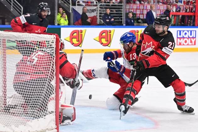 From left goalie of Canada Samuel Montembeault, Czech Jiri Smejkal, Scott Laughton of Canada in action during the IIHF Ice hockey, Eishockey World Championship, WM, Weltmeisterschaft Group B match Czech Republic vs Canada, in Riga, Latvia, May 23, 2023. (CTKxPhoto DavidxTanecek) CTKPhotoP2023052306523  CTKPhotoP2023052306523