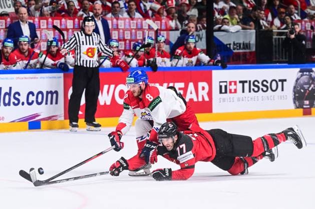From left Czech Ondrej Beranek, Brad Hunt of Canada in action during the IIHF Ice hockey, Eishockey World Championship, WM, Weltmeisterschaft Group B match Czech Republic vs Canada, in Riga, Latvia, May 23, 2023. (CTKxPhoto DavidxTanecek) CTKPhotoP2023052306778  CTKPhotoP2023052306778