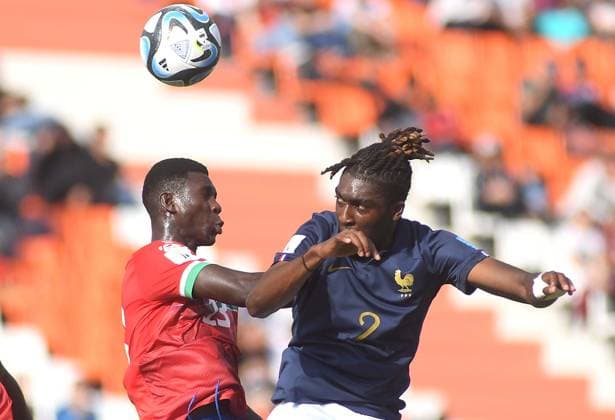 (230526) -- MENDOZA, May 26, 2023 -- Haruna Rasid Njie (L) of Gambia vies with Malamine Efekele of France during the FIFA U20 World Cup group F match between France and Gambia in Mendoza, Argentina, May 25, 2023. ( Handout via Xinhua) (SP)ARGENTINA-MENDOZA-FOOTBALL-2023 FIFA U-20 WORLD CUP-FRANCE VS GAMBIA TELAM 