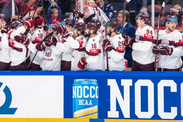 RIGA, LATVIA - MAY 27: Latvia squad celebrates the 1-0 of Dans Locmelis of Latvia (not pictured) during the 2023 IIHF Ice hockey, Eishockey World Championship, WM, Weltmeisterschaft Finland - Latvia game between Canada and Latvia at Nokia Arena on May 27, 2023 in Tampere, Finland. Tampere Finland Copyright: xJustPictures.ch JarixPestelaccix