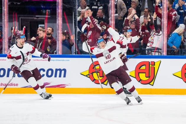 RIGA, LATVIA - MAY 27: Dans Locmelis of Latvia celebrates his goal with Latvian fans during the 2023 IIHF Ice hockey, Eishockey World Championship, WM, Weltmeisterschaft Finland - Latvia game between Canada and Latvia at Nokia Arena on May 27, 2023 in Tampere, Finland. Tampere Finland Copyright: xJustPictures.ch JarixPestelaccix