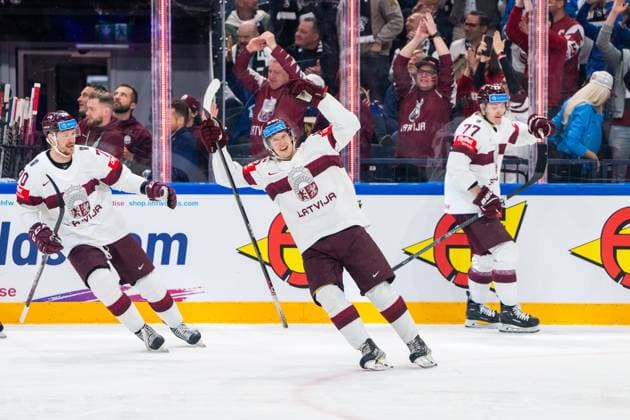 RIGA, LATVIA - MAY 27: Dans Locmelis of Latvia celebrates his goal with Latvian fans during the 2023 IIHF Ice hockey, Eishockey World Championship, WM, Weltmeisterschaft Finland - Latvia game between Canada and Latvia at Nokia Arena on May 27, 2023 in Tampere, Finland. Tampere Finland Copyright: xJustPictures.ch JarixPestelaccix