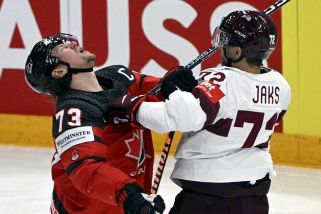 Tyler Toffoli of Canada scuffles with Janis Jaks (R) of Latvia during the 2023 IIHF Ice hockey, Eishockey World Championships semifinal match between Canada and Latvia in Tampere on May 27, 2023. Tampere Finland LKFTJK20230527144200YQDC  Copyright: xJussixNukarix LKFTJK20230527144200YQDC