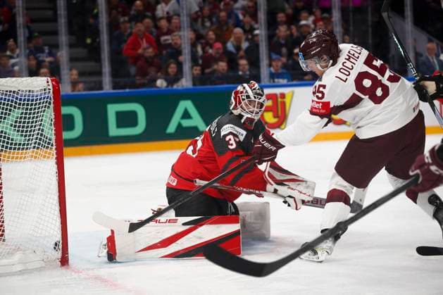 Dans Locmelis 85, LAT scores behind Sam Montembeault 35, CAN during the 2023 IIHF Ice hockey, Eishockey World Championship, WM, Weltmeisterschaft Semifinal match between Canada - Latvia at the Nokia Arena on 27. May 2023 in Tampere, Finland. (KALLE PARKKINEN Newspix24)  Copyright: xKallexParkkinenx np24271458261